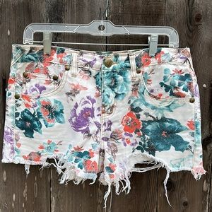 Free People floral denim cutoff shorts (size 28)